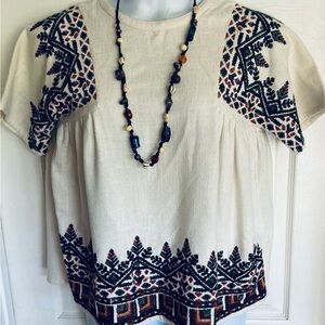 NWOT..Embroidered Cream Peasant Top